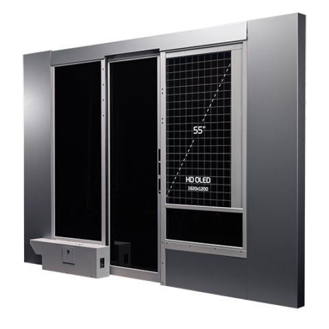 Smart partition with a 55 inch OLED display integrated. Read more in the <a href='https://www.polarteknik.fi/door-systems/partition-walls/smart-partition-wall/'>dedicated product page</a>.